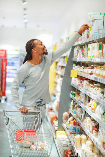 istock eaching for grocery in supermarket 1141374506