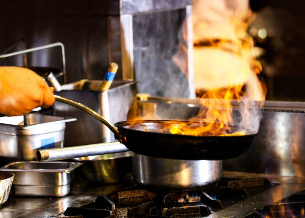 istock Chef preparing food, meal, in the kitchen, chef cooking, Chef decorating dish 1141376826