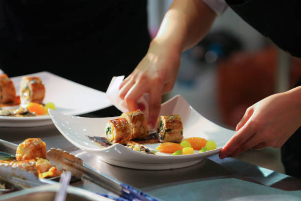 istock Chef preparing food, meal, in the kitchen, chef cooking, Chef decorating dish 1141376830