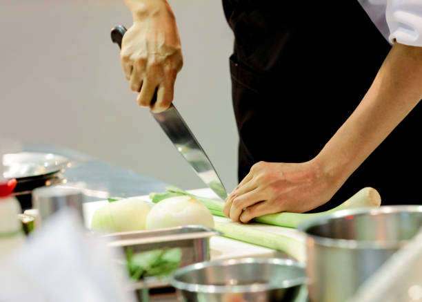 istock Chef preparing food, meal, in the kitchen, chef cooking, Chef decorating dish 1141376846