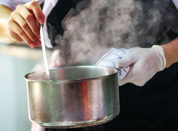 istock Chef preparing food, meal, in the kitchen, chef cooking, Chef decorating dish 1141376850