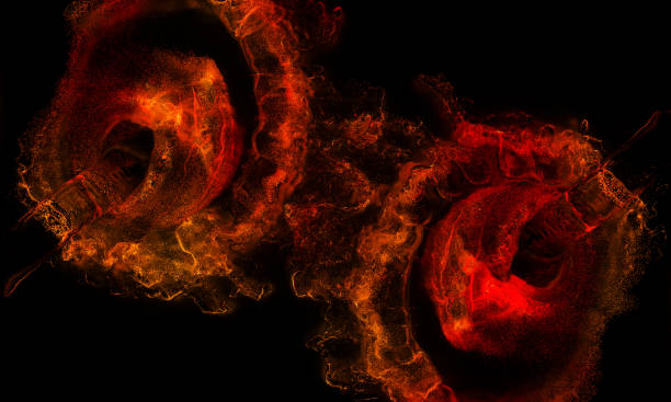 istock Two Large Liquid Jets splashing in a Liquid with Red and Orange waves 1141379372