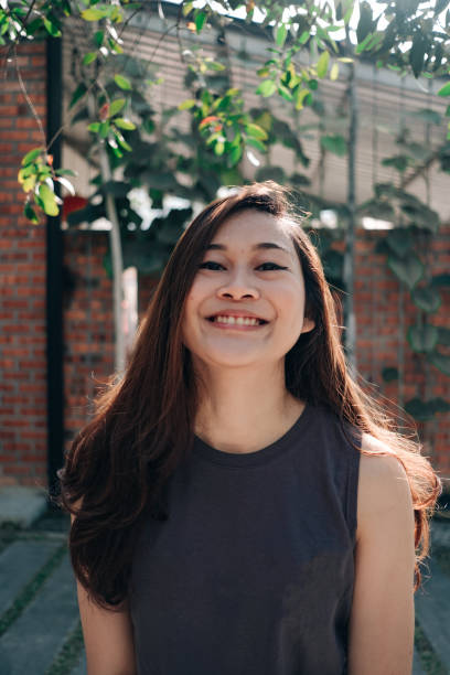 istock Beautiful Young Asian Women Smiling 1141380871