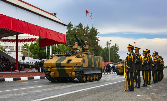 Nicosia, Cyprus, November 15, 2014: An armored personnel carrier passes the grandstand with politicians and generals. The parade took place on the occasion of the anniversary of the 'Turkish Republic of North Cyprus'.