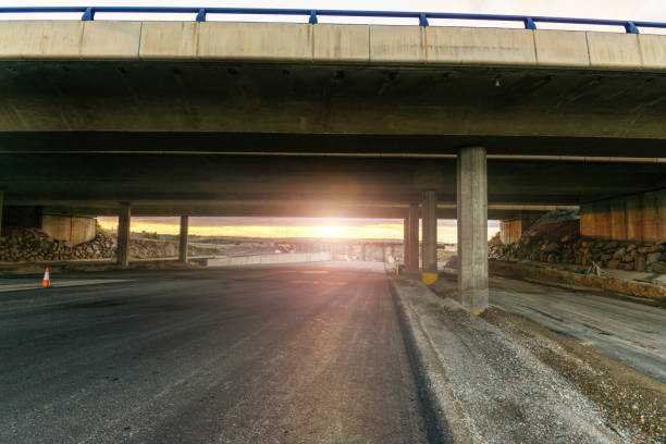 istock Newly paved highway under the construction of a bridge 1141386806