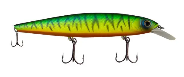 Photo of spinner lures isolated on white background .fishing spinners and wobblers multi-colored .