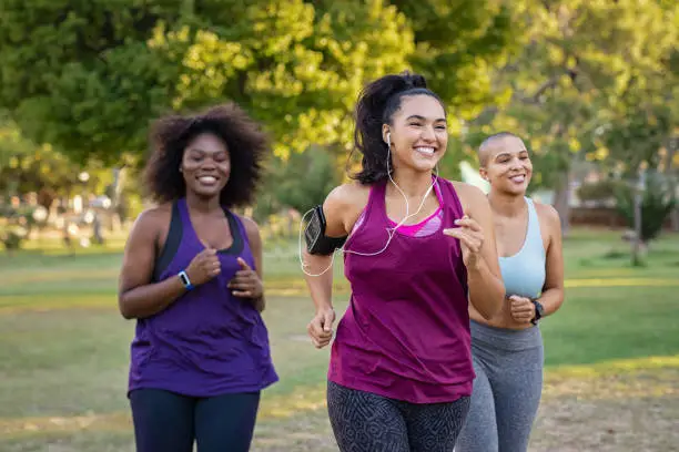 Photo of Active curvy women jogging
