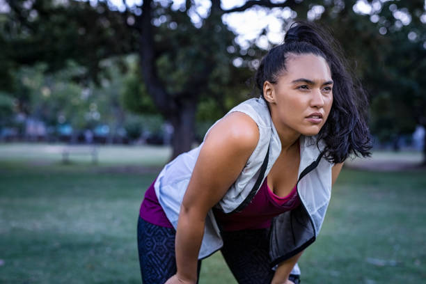 istock Curvy woman tired after running 1141394635