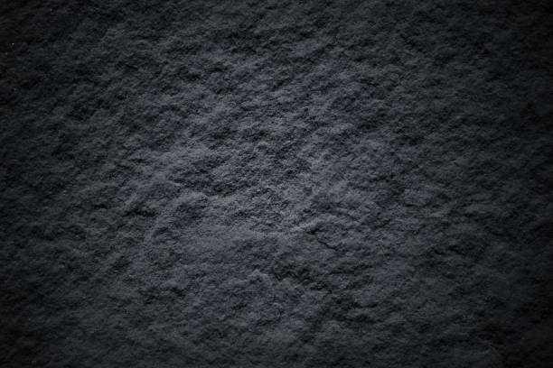 istock Dark black slate background or old gray stone nature texture 1141395501