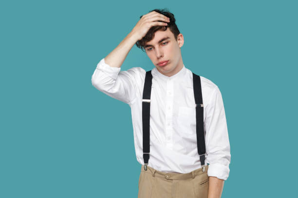 istock Sad loser man holding his head and confused. 1141396902