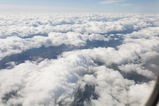 View on soft white clouds from the plane.