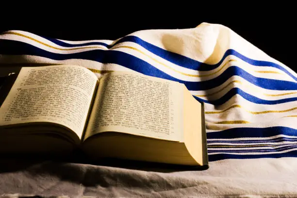 Hebrew prayer book and a tallit, a jewish prayer shawl