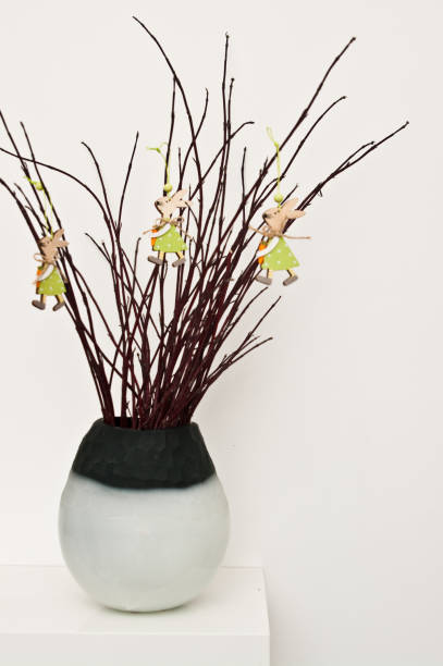 istock Easter bunny decoration with twigs on white 1141401520