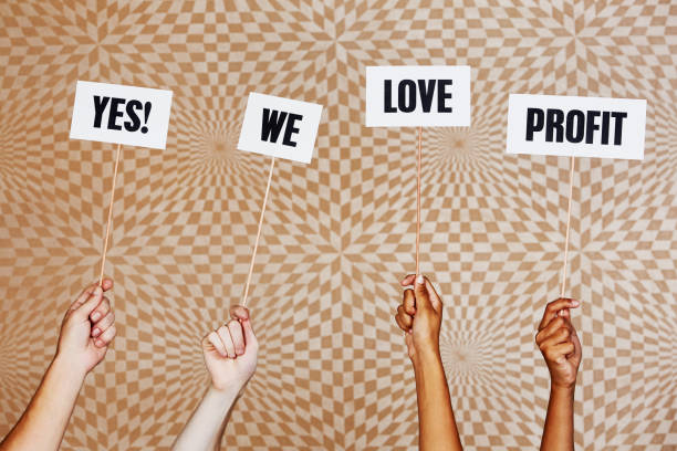 istock Raised hands hold signs 