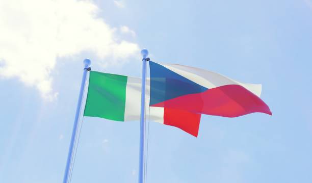 istock Czech Republic and Italy, two flags waving against blue sky 1141402629