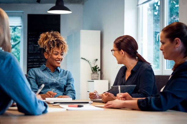 istock Smiling business expertise working together 1141404697