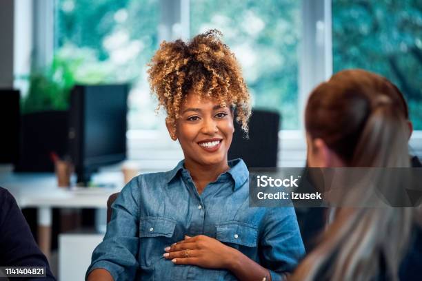 Smiling Pregnant Woman Working In New Office Stock Photo - Download Image Now - Pregnant, Women, Working