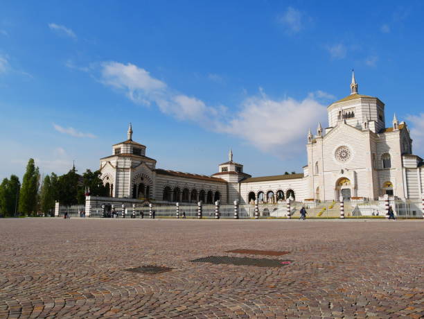 istock Architectural building with forecourt and blue sky with clouds 1141406064
