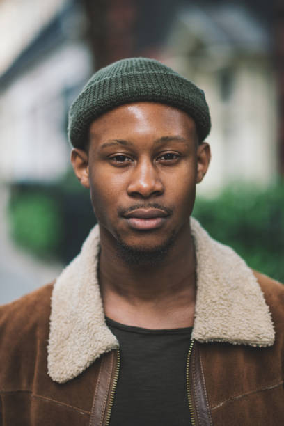 istock Millennial generation African man posing and looking into camera. 1141406411