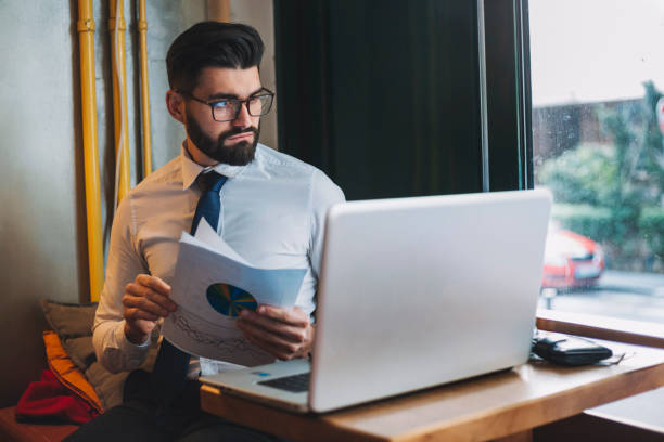 istock Young businessman at coffee shop 1141406867