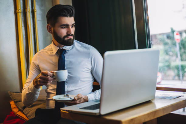 istock Young Confident  businessman at coffee shop 1141407664