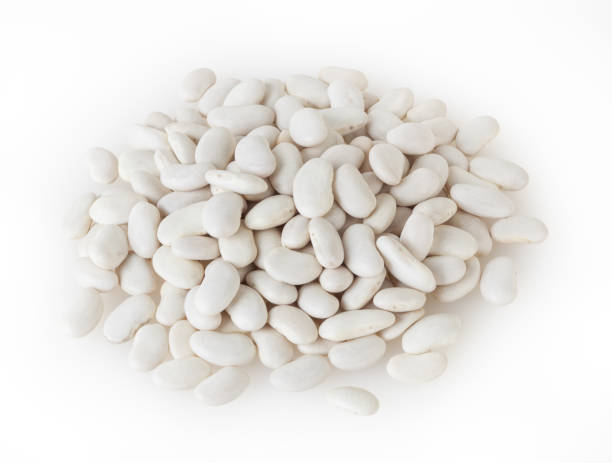 istock Heap of white beans isolated on white background with clipping path 1141410061
