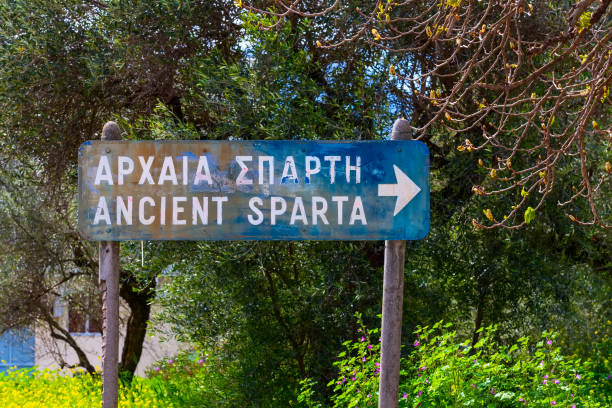 Signpost to ancient Sparta, Peloponnese, Greece Sparta, Greece - March 29, 2019: Sign to Ancient Sparta site in Peloponnese sparta greece photos stock pictures, royalty-free photos & images