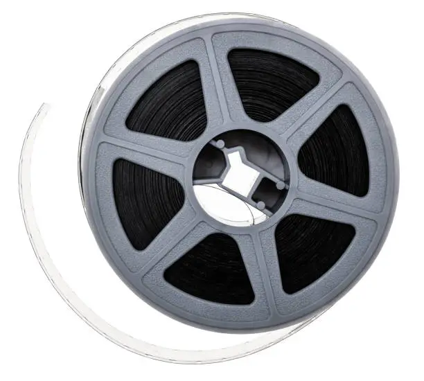 Photo of macro photo of real 16mm reel on white background