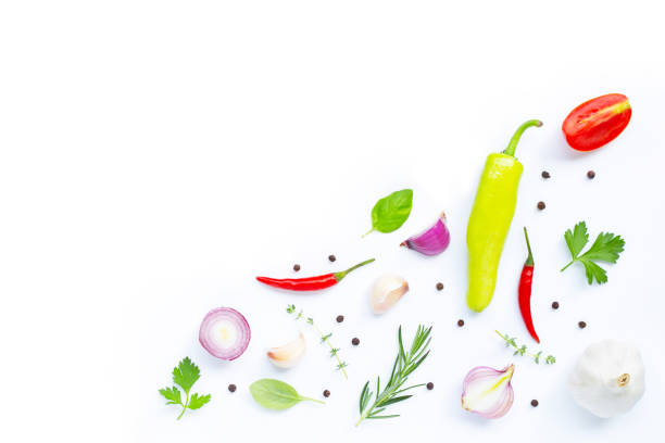 istock Various fresh vegetables and herbs on white background. Healthy eating concept 1141415251