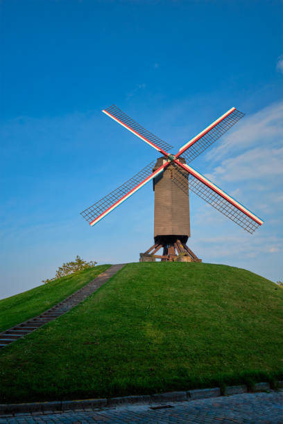 sint-janshuismolen sint-janshuis molino molino en brujas en sunset, bélgica - belgium bruges windmill europe fotografías e imágenes de stock
