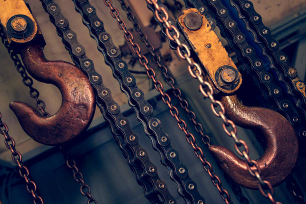 istock Background of chains and hooks, tinted, distorted perspective 1141418064