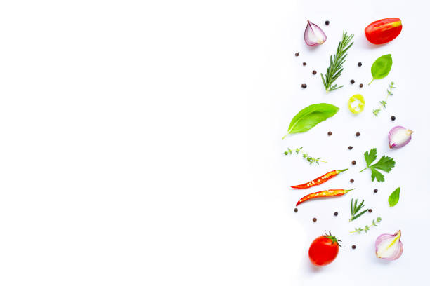 istock Various fresh vegetables and herbs on white background. Healthy eating concept 1141418868