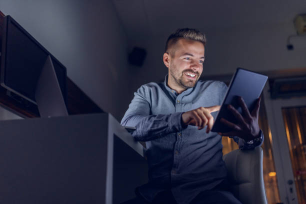 1,400+ Smiling Computer Programmer Using Tablet Stock Photos, Pictures ...
