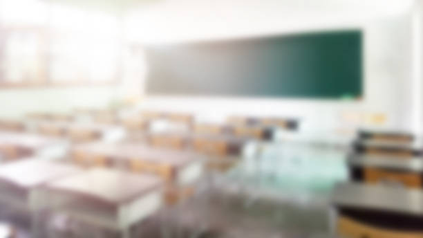 istock School classroom in blur background without young student; Blurry view of elementary class room no kid or teacher with chairs and tables in campus. 1141425315