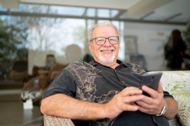 istock Portrait of senior man using smartphone 1141430861