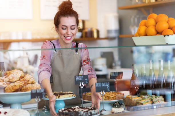 istock Woman working in coffee shop 1141431242