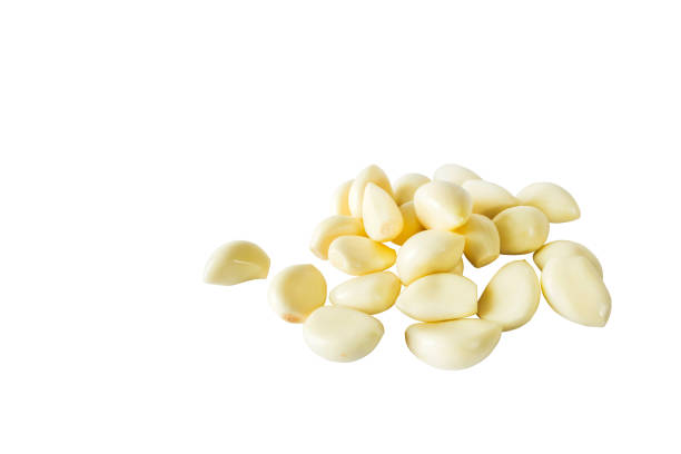 istock Garlic cloves isolated on the white color background 1141432898