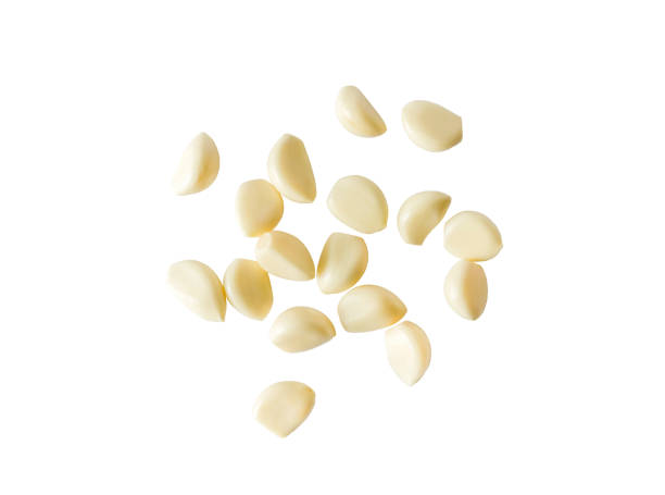 istock Garlic cloves isolated on the white background 1141432930