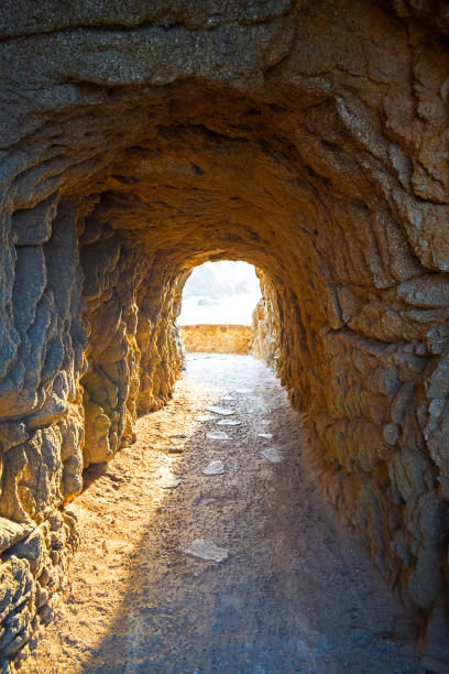 istock Mountain tunnel near sea 1141433597