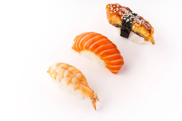 istock Creative layout with various sushi on white background. Shrimp, eel, salmon. 1141435303