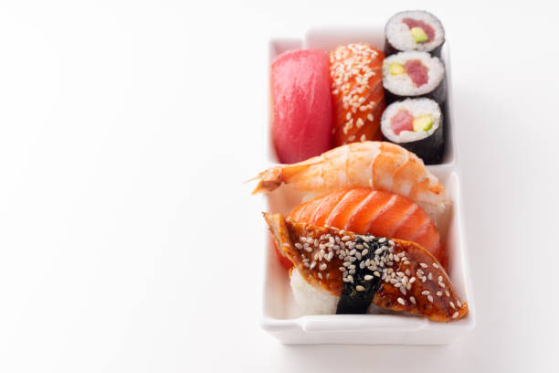 istock Creative layout with various sushi on white background. Shrimp, eel, salmon and tuna 1141435318