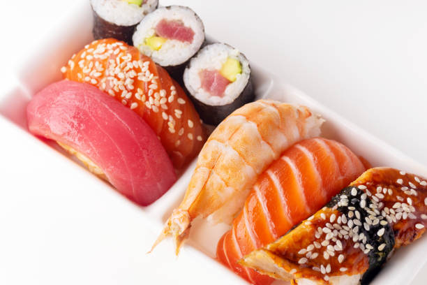 istock Creative layout with various sushi on white background. Shrimp, eel, salmon and tuna 1141435351