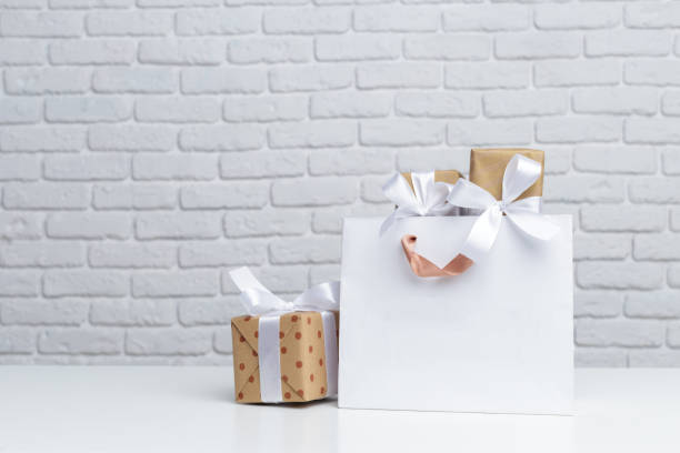 istock Gift box in paper shopping bag 1141436900