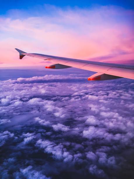 istock Wing of an Airplane at Sunset 1141437292