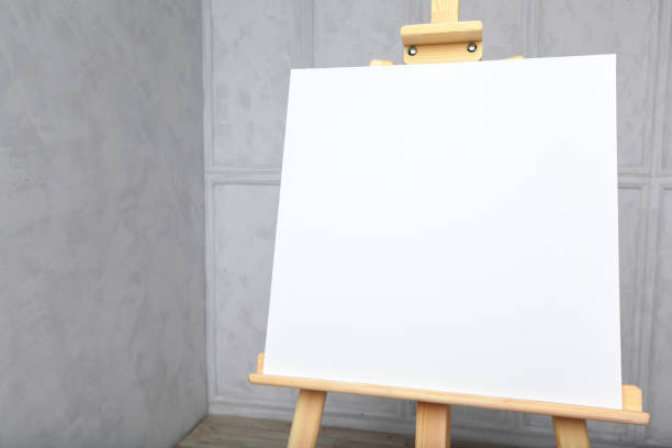 istock Wooden easel in the room 1141437333