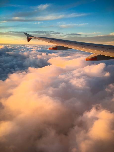 istock Wing of an Airplane at Sunset 1141437350