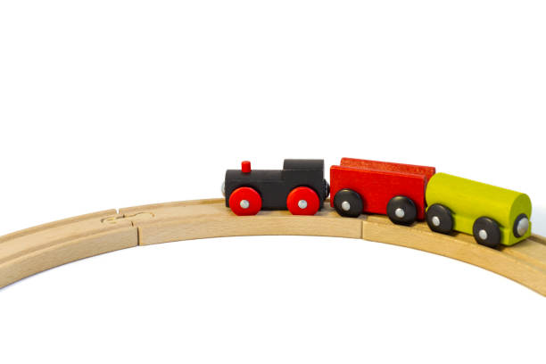 istock Colorful wooden toy train goes on rails. 1141441848