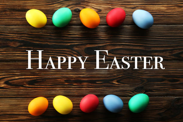 istock Easter greeting card concept. Festive composition on wooden background. 1141442635