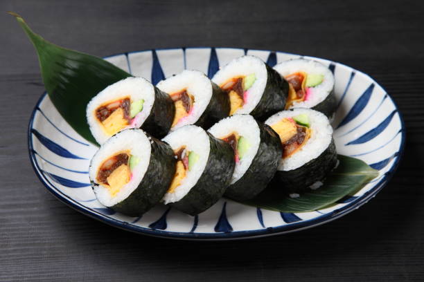 istock thick roll of makizushi 1141444436
