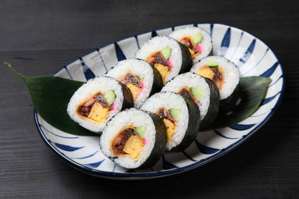 istock thick roll of makizushi 1141445318